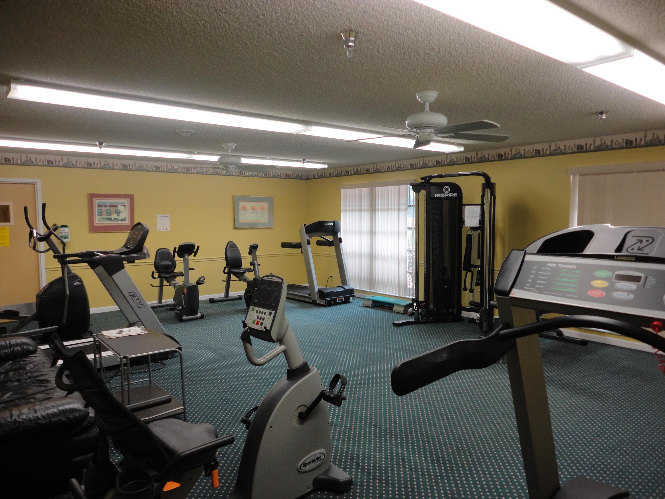 8946 Meadowlark Way, Unit D Boca Raton, FL 33496 - Photo 29 of 32 Parklane Clubhouse Exercise Room