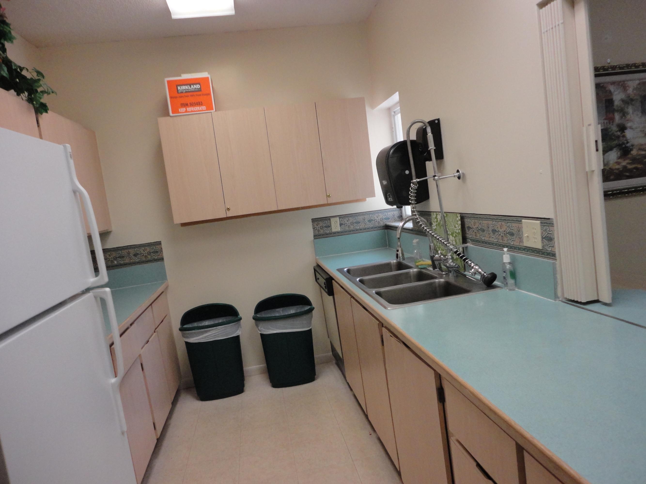 8946 Meadowlark Way, Unit D Boca Raton, FL 33496 - Photo 31 of 32 Parklane Clubhouse Kitchen