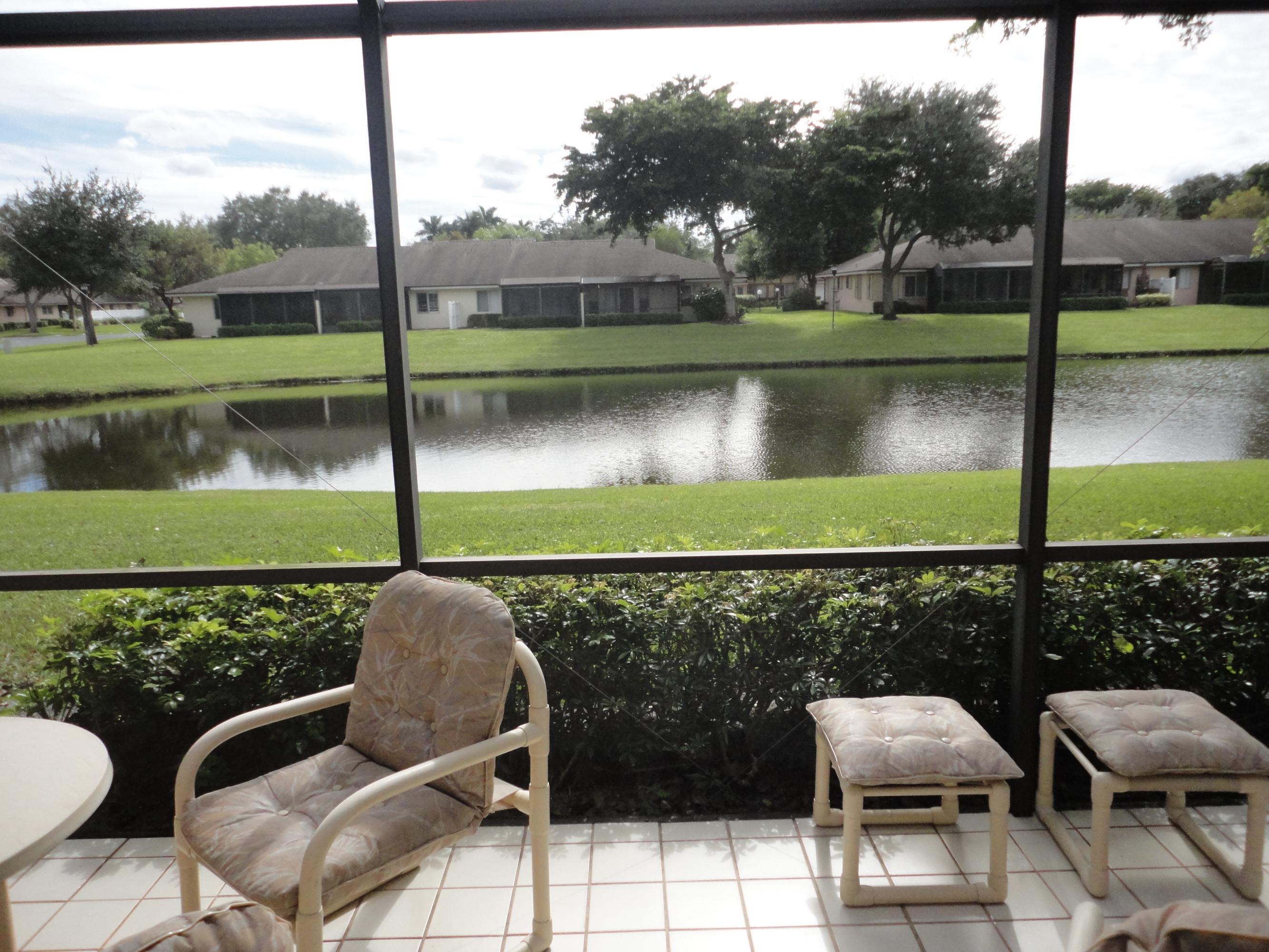 8946 Meadowlark Way, Unit D Boca Raton, FL 33496 - Photo 4 of 32 Screened Porch