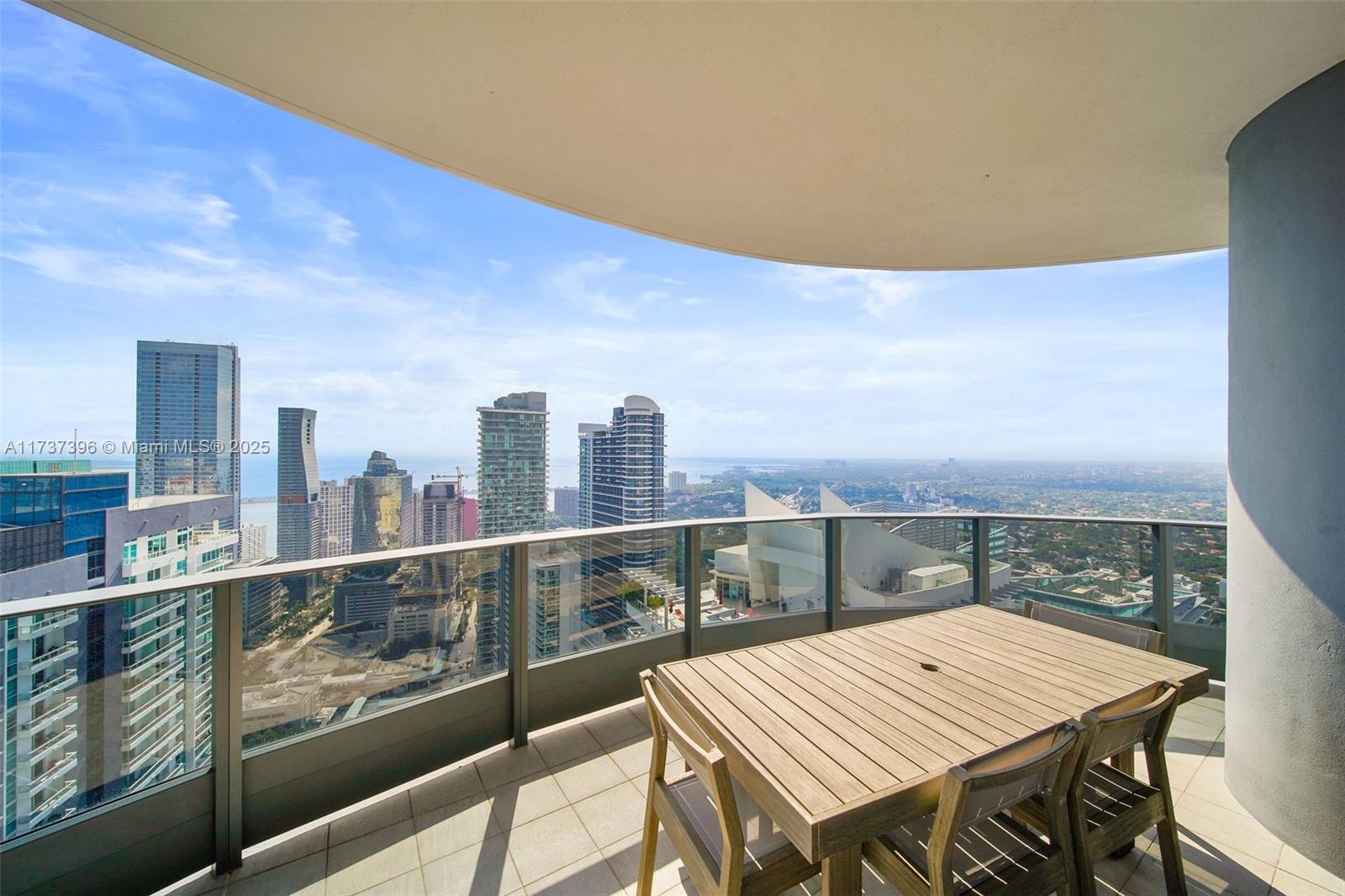 1000 Brickell Plaza, Unit PH5002 Miami, FL 33131 - Photo 2 of 68 a view of a balcony with city view