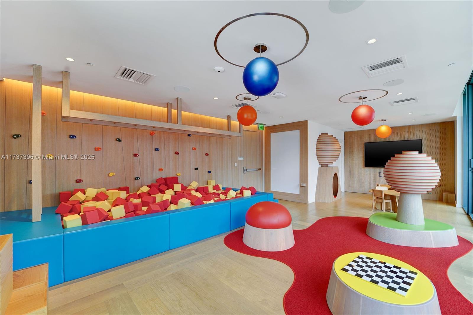 1000 Brickell Plaza, Unit PH5002 Miami, FL 33131 - Photo 64 of 68 a bathroom with a sink mirror and vanity