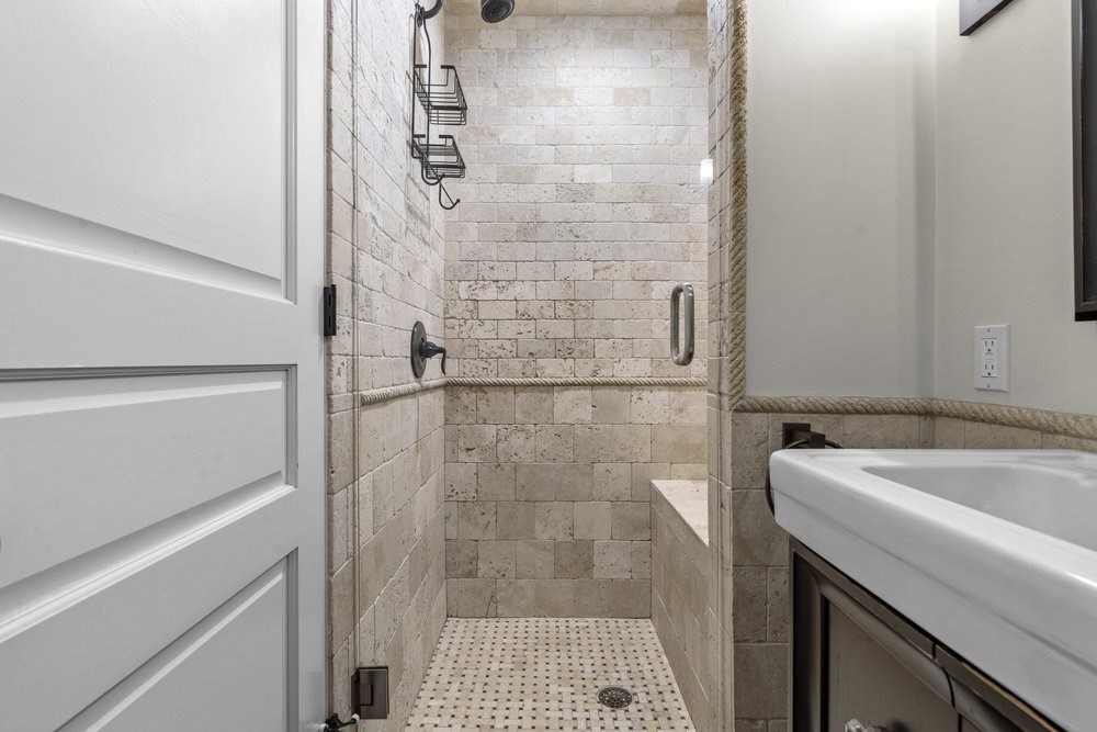 161 Tudor Street, Unit 4 Boston, MA 02127 - Photo 20 of 34 a bathroom with a sink and a shower