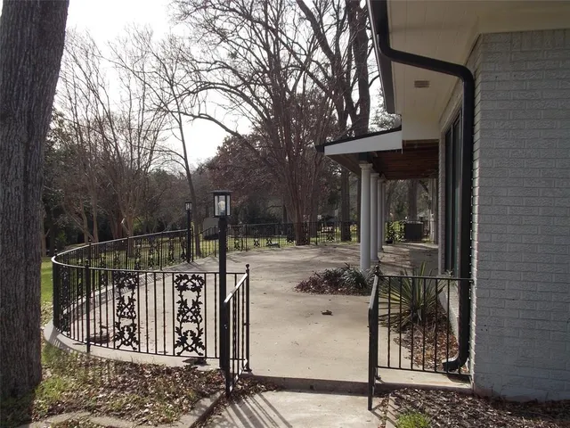 a view of street along with trees
