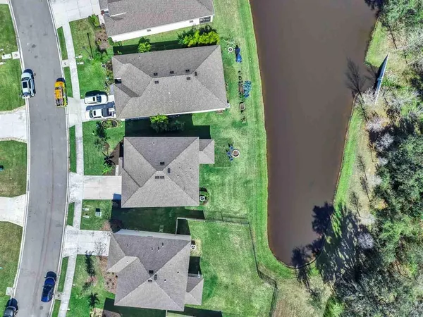 a view of yard with patio