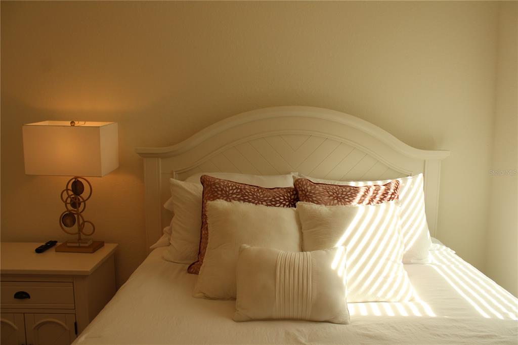 18017 Gawthrop Drive, Unit 104 Bradenton, FL 34211 - Photo 20 of 54 a bathroom with a bathtub and mirror