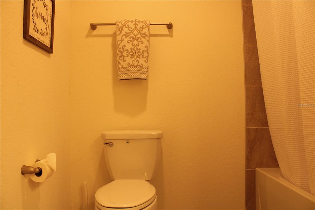18017 Gawthrop Drive, Unit 104 Bradenton, FL 34211 - Photo 23 of 54 a bathroom with a toilet