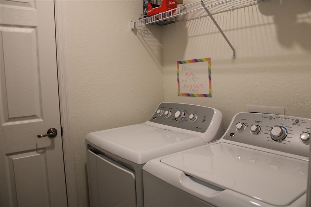 18017 Gawthrop Drive, Unit 104 Bradenton, FL 34211 - Photo 27 of 54 a utility room with dryer and washer