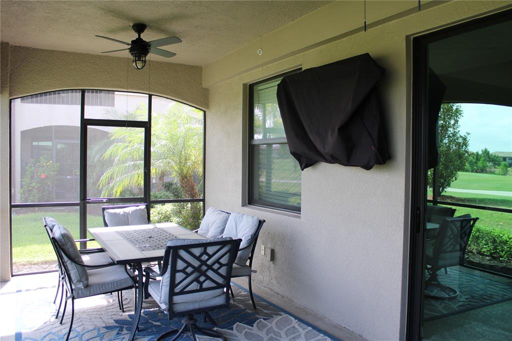 18017 Gawthrop Drive, Unit 104 Bradenton, FL 34211 - Photo 29 of 54 a view of a dining room with furniture window and outside view
