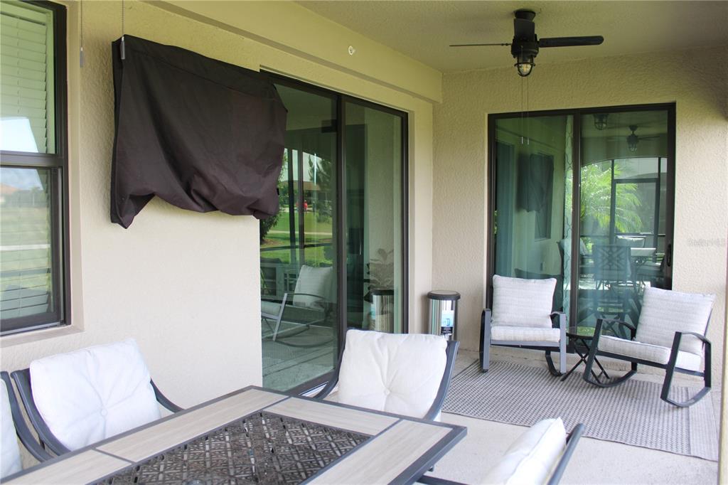 18017 Gawthrop Drive, Unit 104 Bradenton, FL 34211 - Photo 30 of 54 a living room with furniture and a window