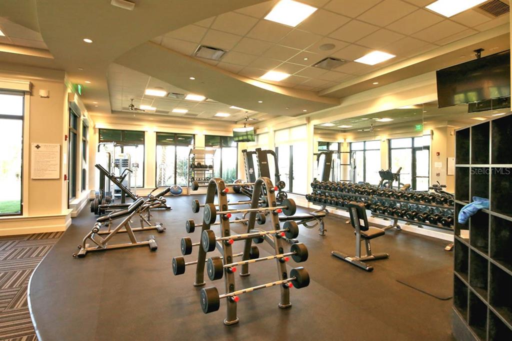 18017 Gawthrop Drive, Unit 104 Bradenton, FL 34211 - Photo 46 of 54 a view of a room with gym equipment