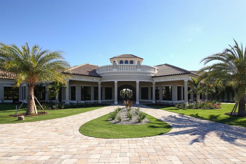 18017 Gawthrop Drive, Unit 104 Bradenton, FL 34211 - Photo 52 of 54 a front view of a house with garden and porch