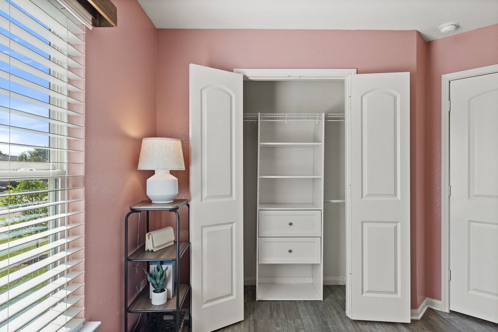 217 Farmer Lane Jarrell, TX 76537 - Photo 23 of 29 A comforting nursery with a striking wood plank accent wall, closet built-ins and abundant natural light.