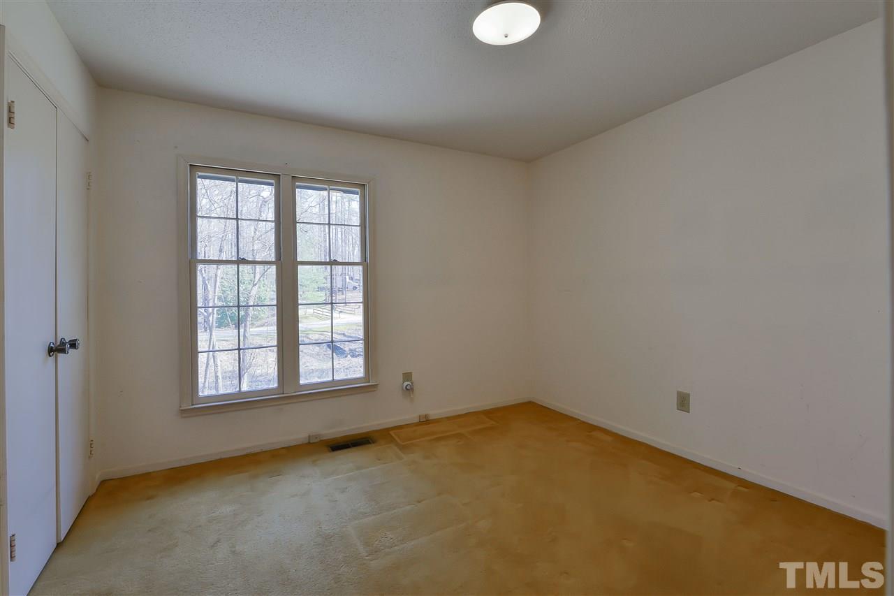 6712 Laurdane Road Raleigh, NC 27613 - Photo 17 of 25 an empty room with a window