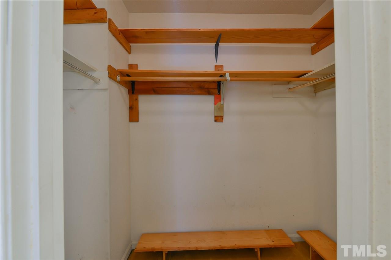 6712 Laurdane Road Raleigh, NC 27613 - Photo 20 of 25 a view of small space with racks on the wall