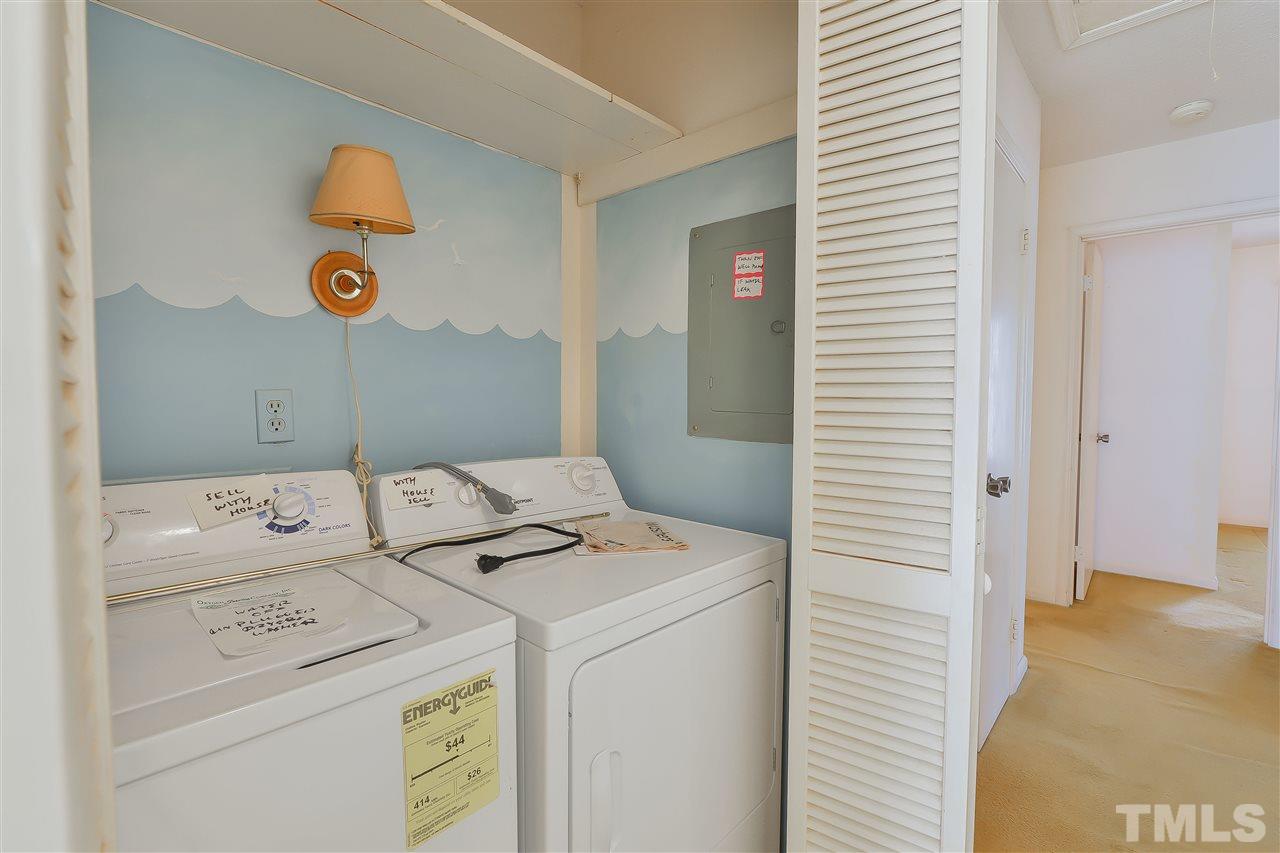 6712 Laurdane Road Raleigh, NC 27613 - Photo 23 of 25 a utility room with dryer and washer