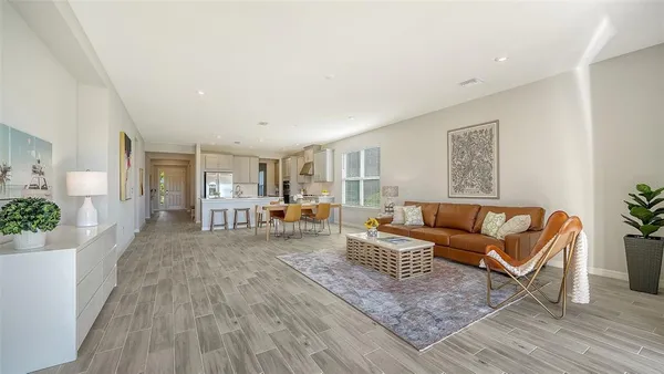 a kitchen with lots of counter top space and stainless steel appliances