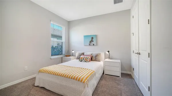 a lake view with a building in the background