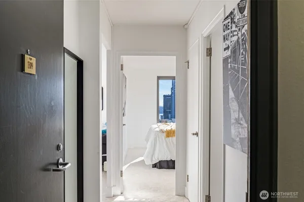 a view of a bathroom from a hallway