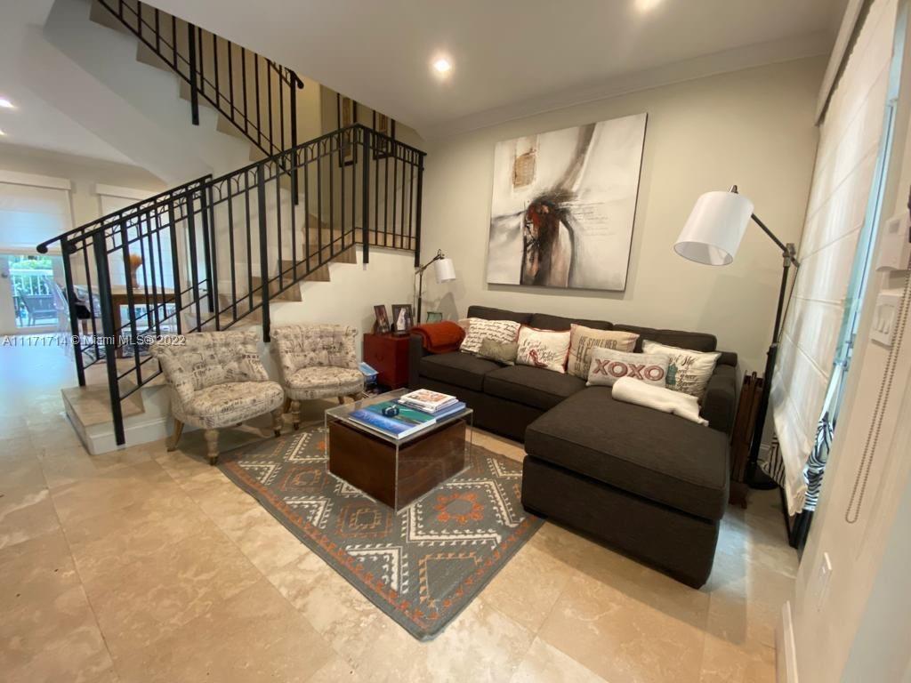584 Fernwood Road Key Biscayne, FL 33149 - Photo 4 of 24 a living room with furniture