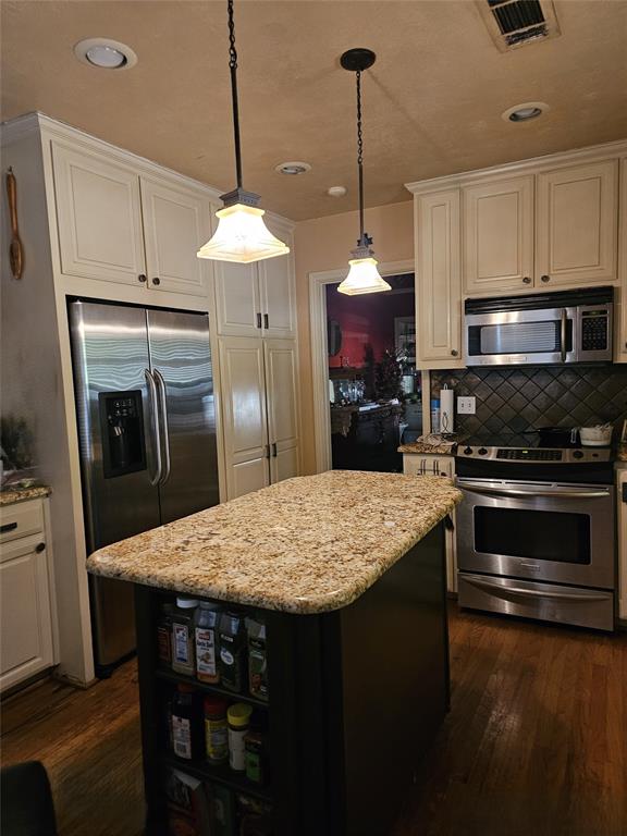 122 East 7th Street Lancaster, TX 75146 - Photo 1 of 5 Granite countertops, hardwood floors, island bar, back splash