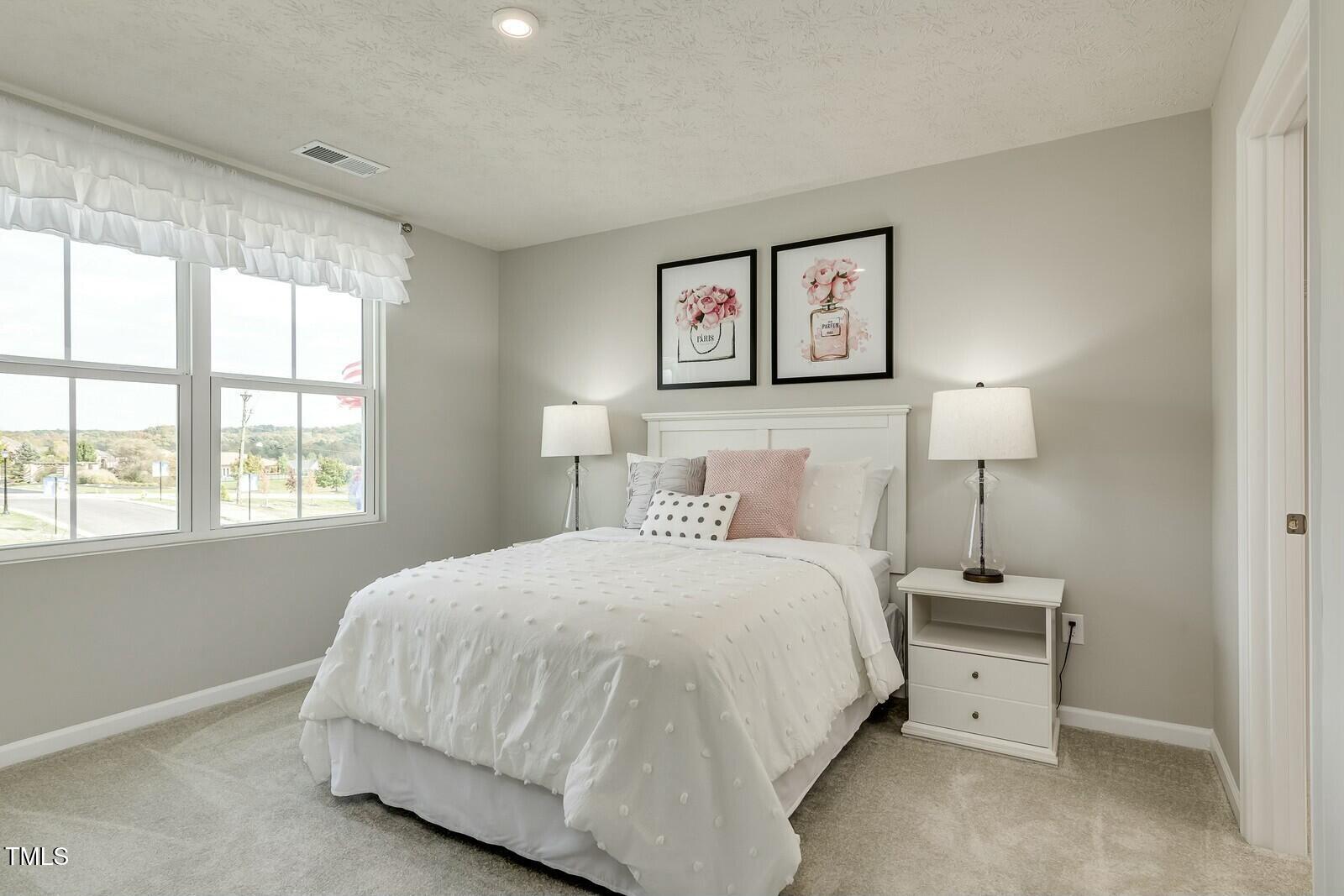 4185 Mantis Court Bailey, NC 27807 - Photo 15 of 20 a bedroom with a bed and a window