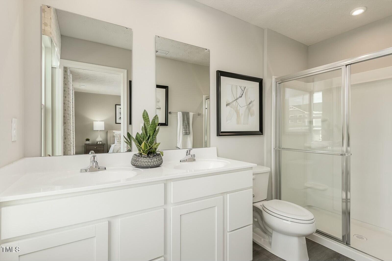 4185 Mantis Court Bailey, NC 27807 - Photo 19 of 20 a bathroom with a sink toilet and shower
