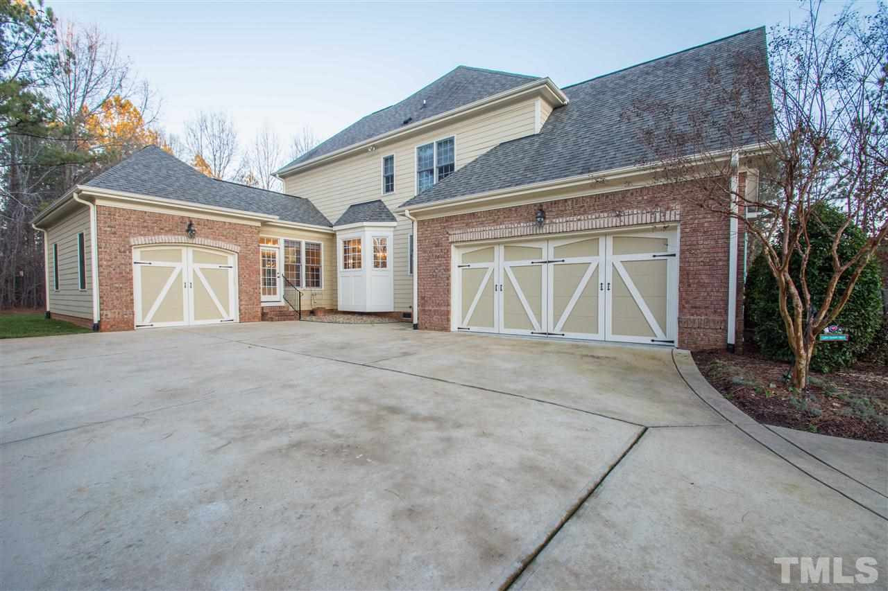 1068 Tacketts Pond Drive Raleigh, NC 27614 - Photo 24 of 25 Ideal three car garage and large driveway Garage