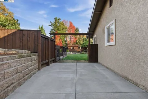 a backyard of a house with lots of green space