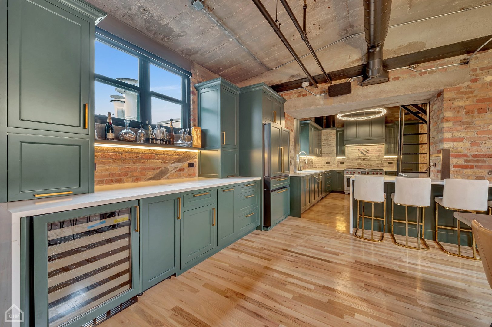 1017 West Washington Boulevard, Unit 7APH Chicago, IL 60607 - Photo 2 of 30 a kitchen with stainless steel appliances granite countertop a sink and cabinets
