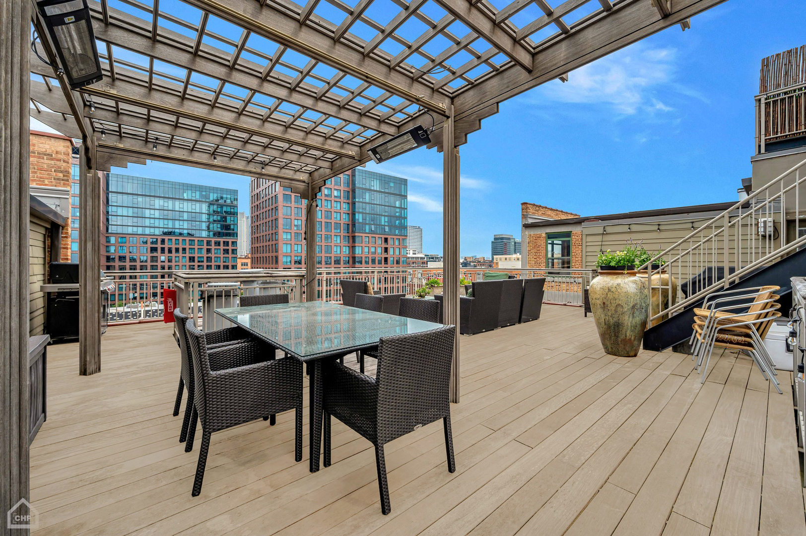 1017 West Washington Boulevard, Unit 7APH Chicago, IL 60607 - Photo 28 of 30 a dining room with furniture and a floor to ceiling window