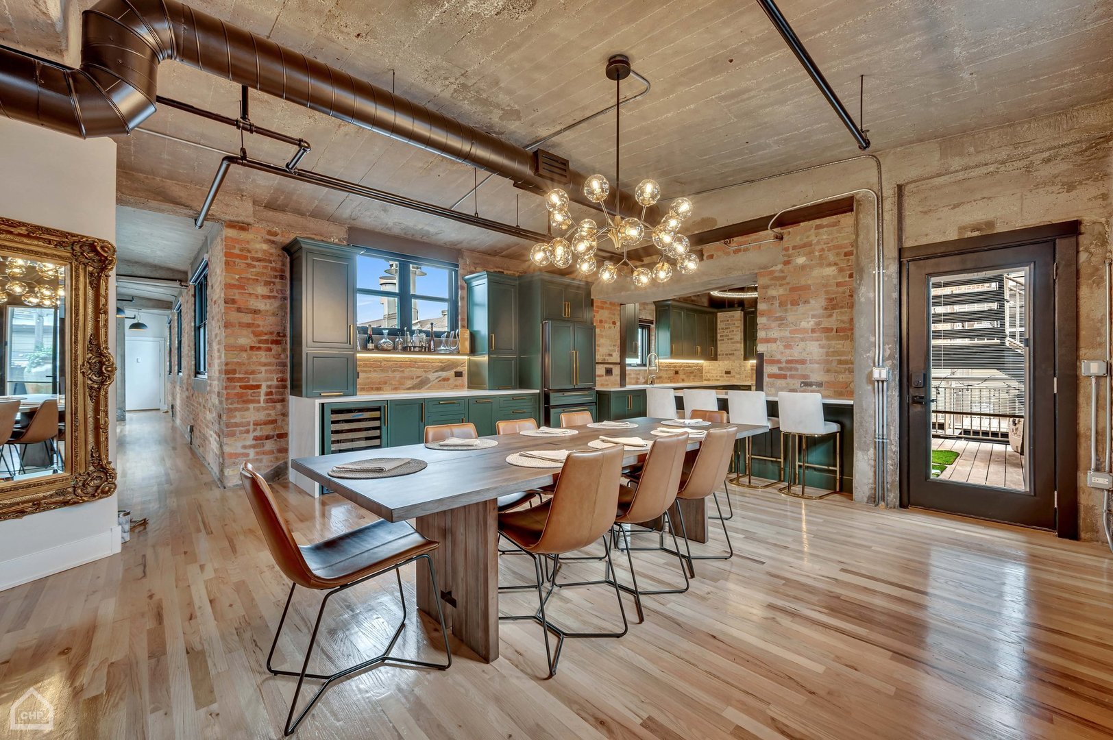 1017 West Washington Boulevard, Unit 7APH Chicago, IL 60607 - Photo 9 of 30 a view of a dining room with furniture window and wooden floor