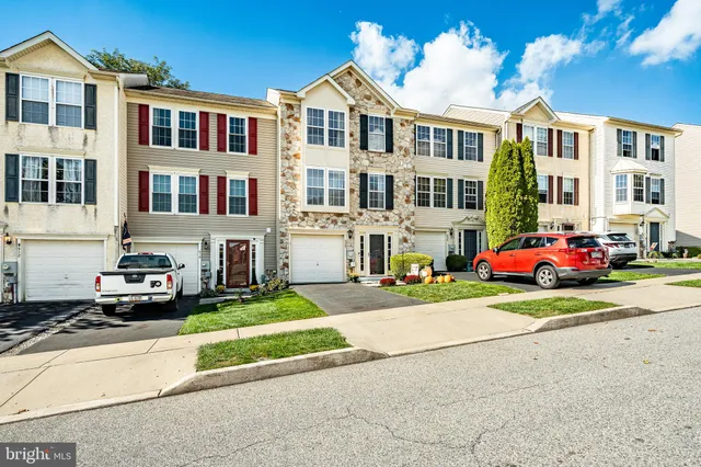 a cars parked in front of a building