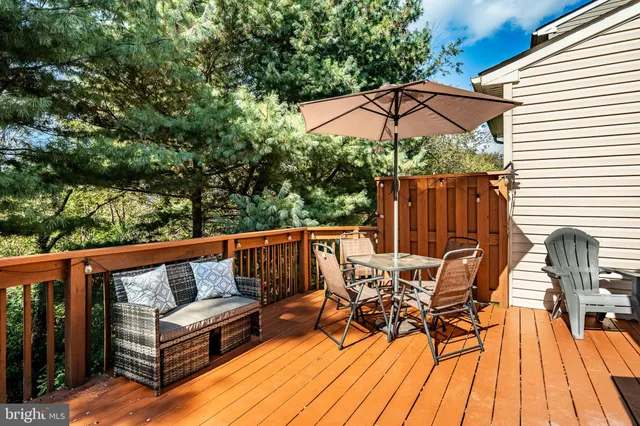 a view of a two chairs in the balcony