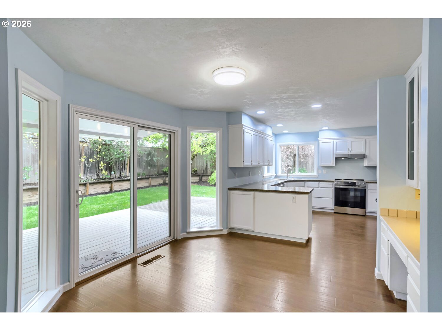 8160 Southwest 147th Terrace Beaverton, OR 97007 - Photo 11 of 31 a large white kitchen with a large window