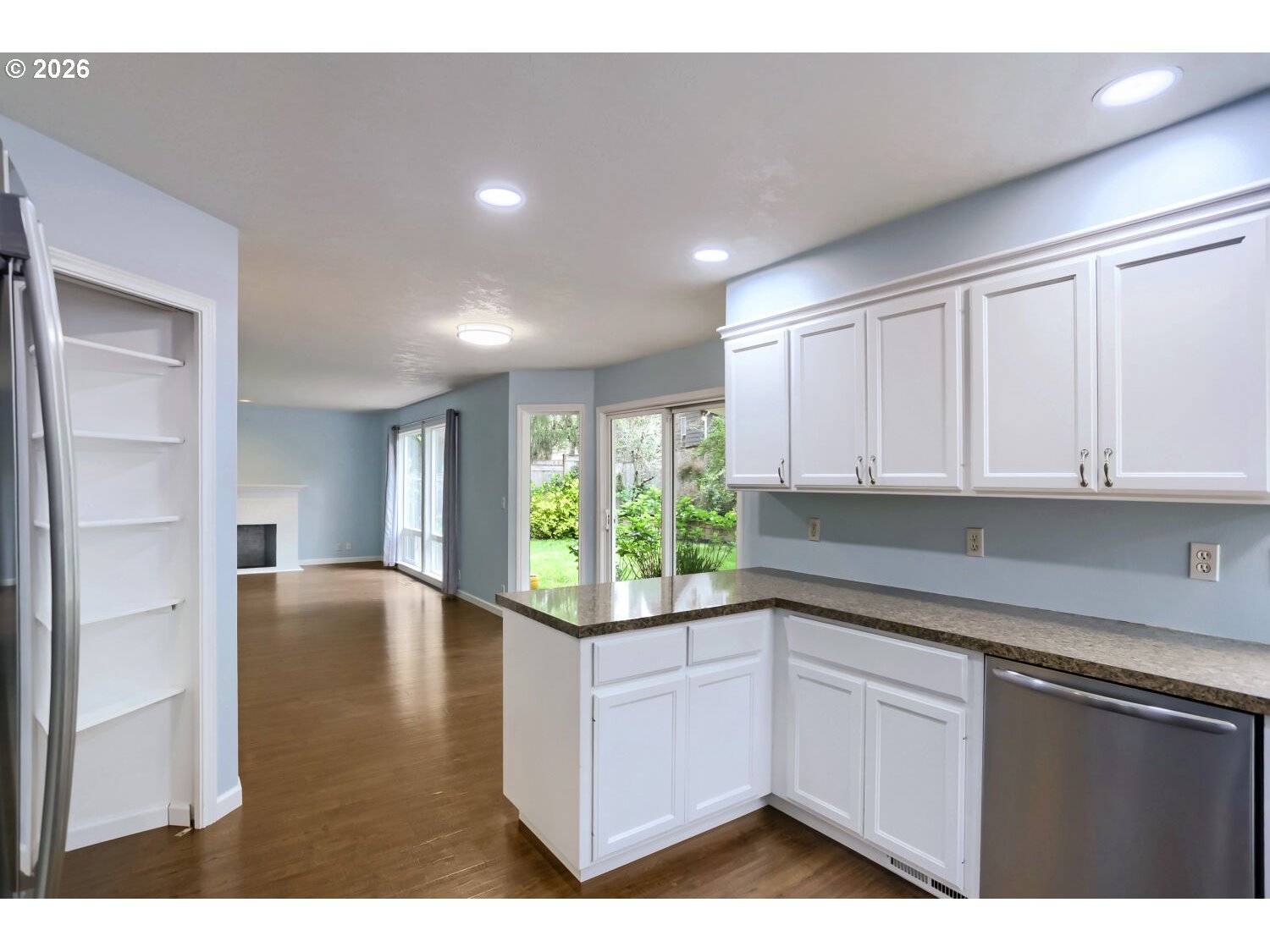 8160 Southwest 147th Terrace Beaverton, OR 97007 - Photo 15 of 31 a kitchen with a sink cabinets and window