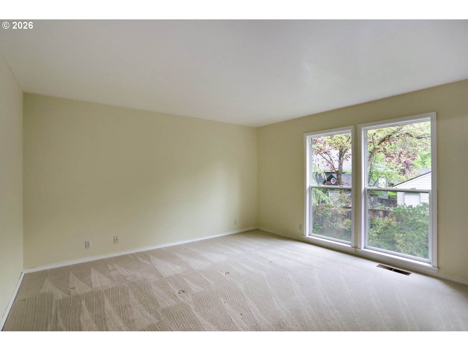8160 Southwest 147th Terrace Beaverton, OR 97007 - Photo 18 of 31 a view of an empty room with a window