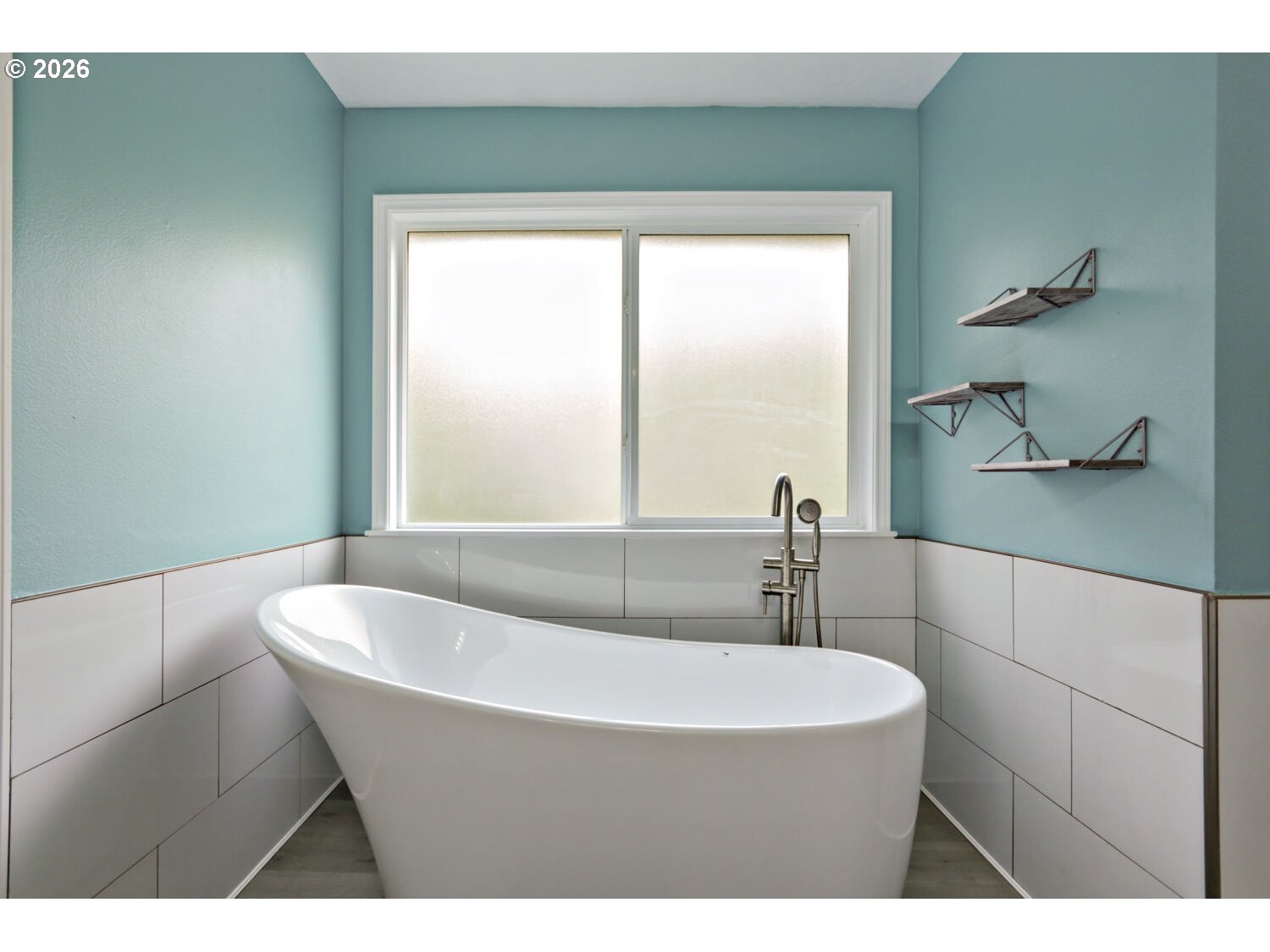 8160 Southwest 147th Terrace Beaverton, OR 97007 - Photo 20 of 31 a bathroom with a bathtub and a sink