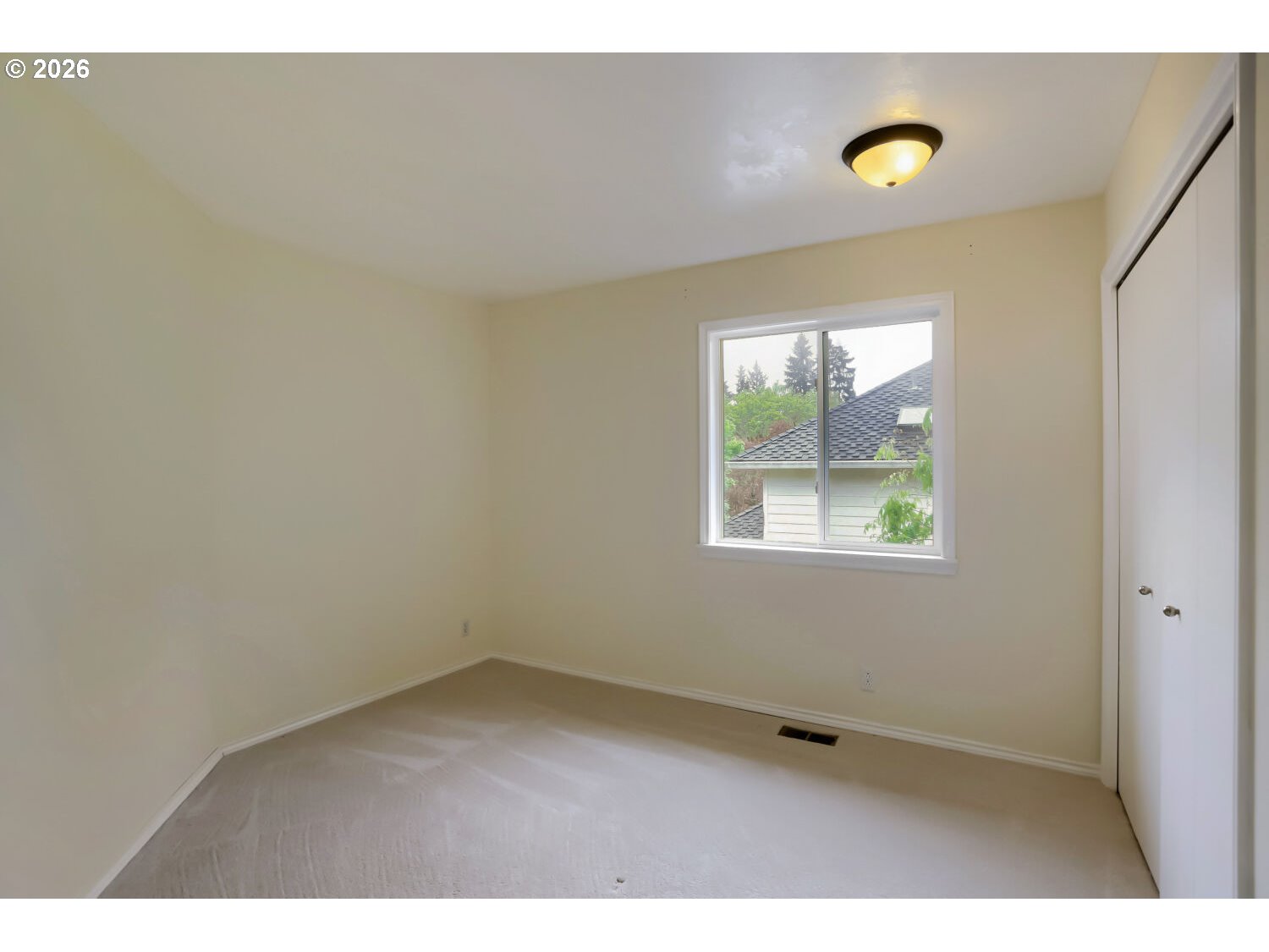 8160 Southwest 147th Terrace Beaverton, OR 97007 - Photo 23 of 31 a view of an empty room and window
