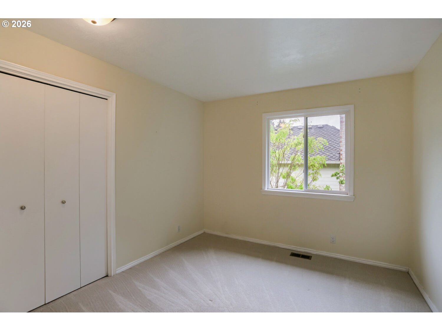 8160 Southwest 147th Terrace Beaverton, OR 97007 - Photo 24 of 31 a view of an empty room with a window