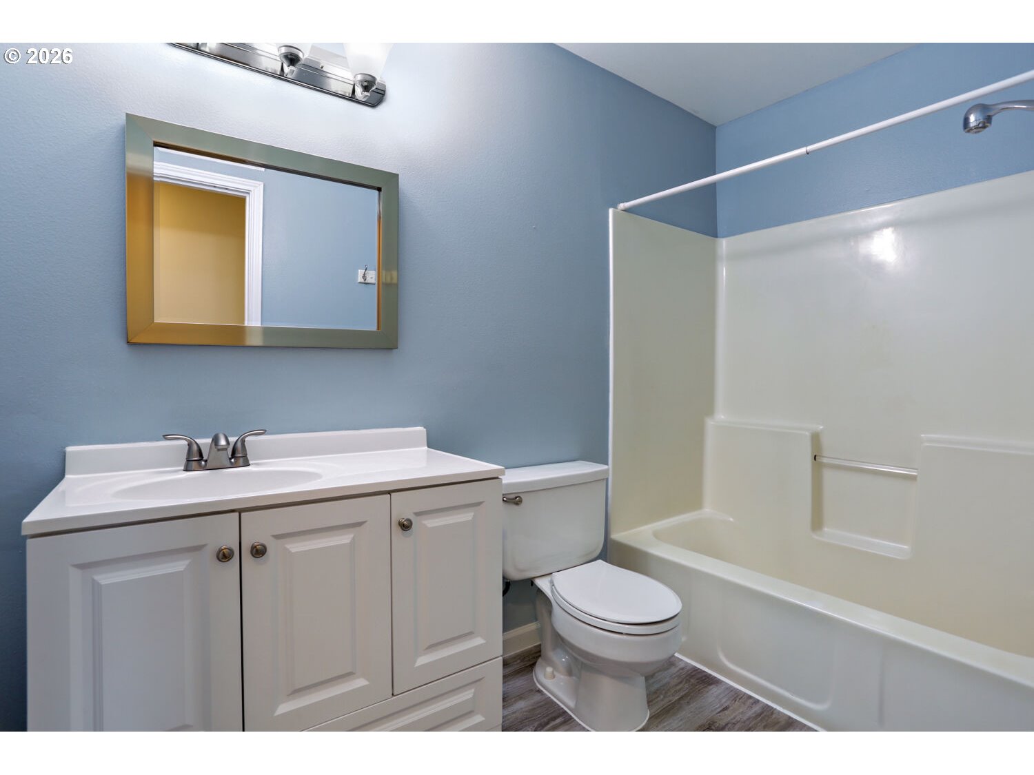8160 Southwest 147th Terrace Beaverton, OR 97007 - Photo 25 of 31 a bathroom with a toilet sink vanity granite and mirror