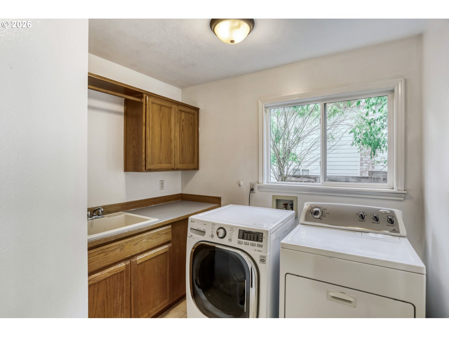 8160 Southwest 147th Terrace Beaverton, OR 97007 - Photo 26 of 31 a utility room with dryer and washer
