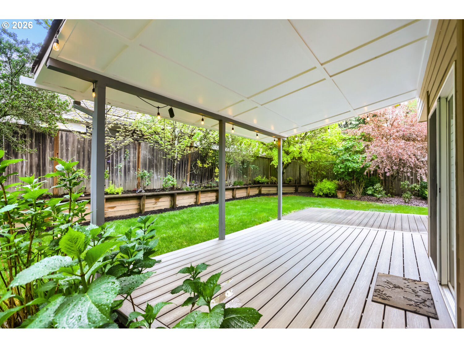 8160 Southwest 147th Terrace Beaverton, OR 97007 - Photo 27 of 31 a view of porch with a garden