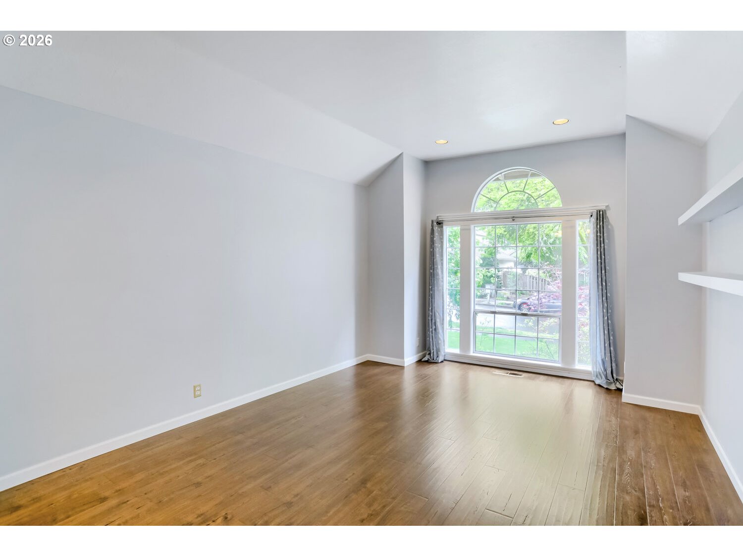 8160 Southwest 147th Terrace Beaverton, OR 97007 - Photo 6 of 31 a view of an empty room with a window