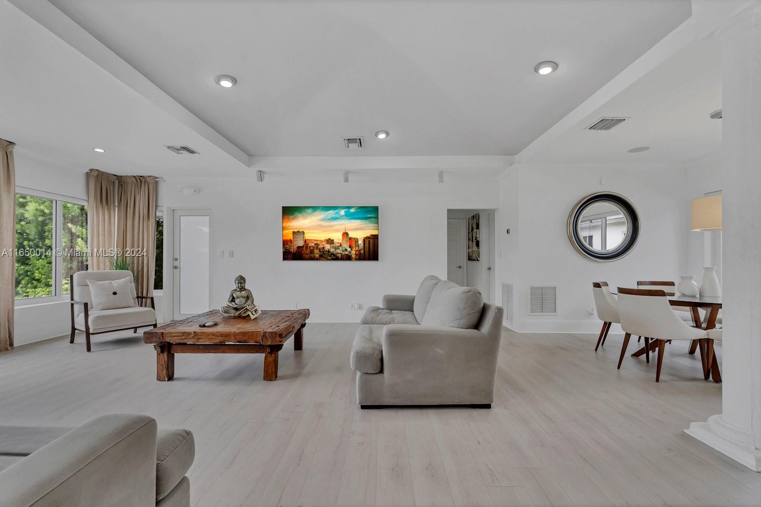 900 Surfside Boulevard Surfside, FL 33154 - Photo 15 of 38 a living room with furniture and a window