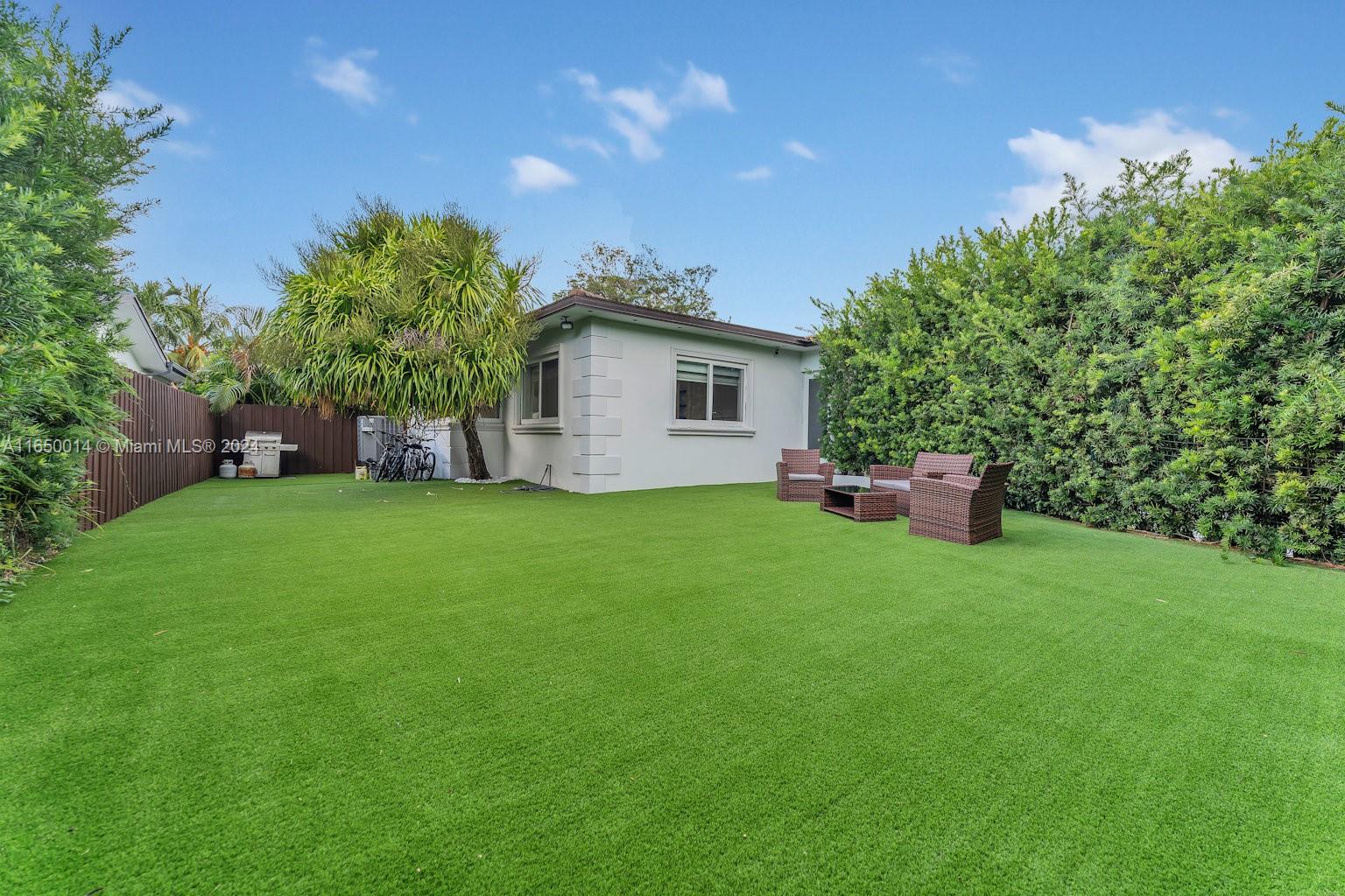 900 Surfside Boulevard Surfside, FL 33154 - Photo 34 of 38 a house view with a garden space