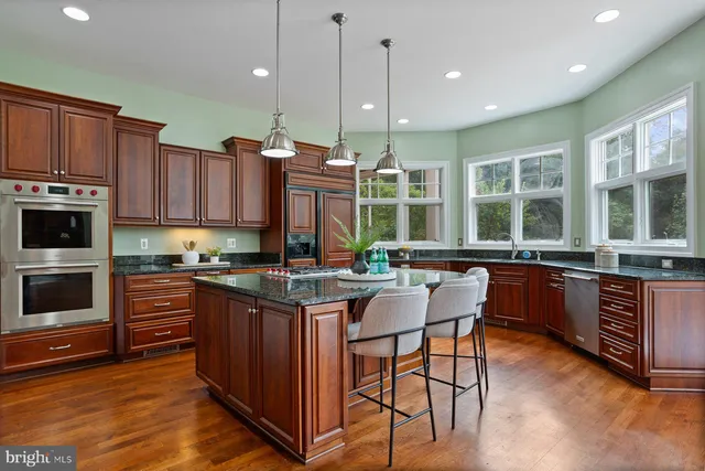 a view of balcony with wooden floor and outdoor seating