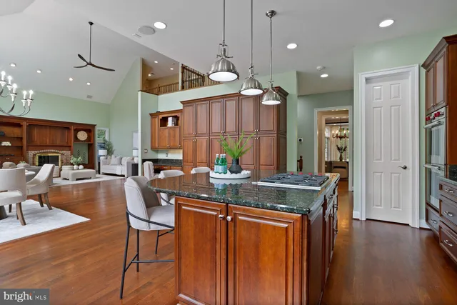 a view of balcony with wooden floor and seating space