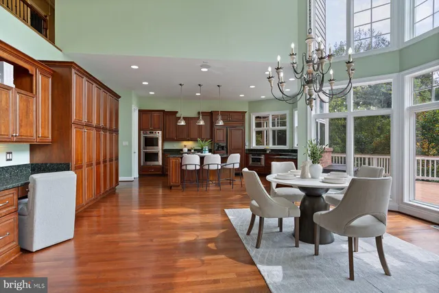 a view of a livingroom with furniture and wooden floor