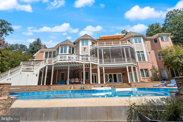 a reading room with furniture window and book shelf