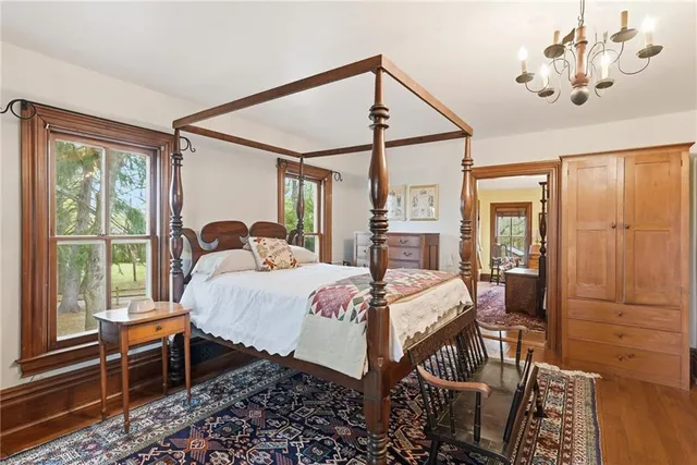 a bed room with a bed and furniture